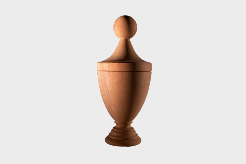 Boston Turning Works Finials. Style F107 is kicl-dried wood with a chalice-shaped base and smaller round ball on top.